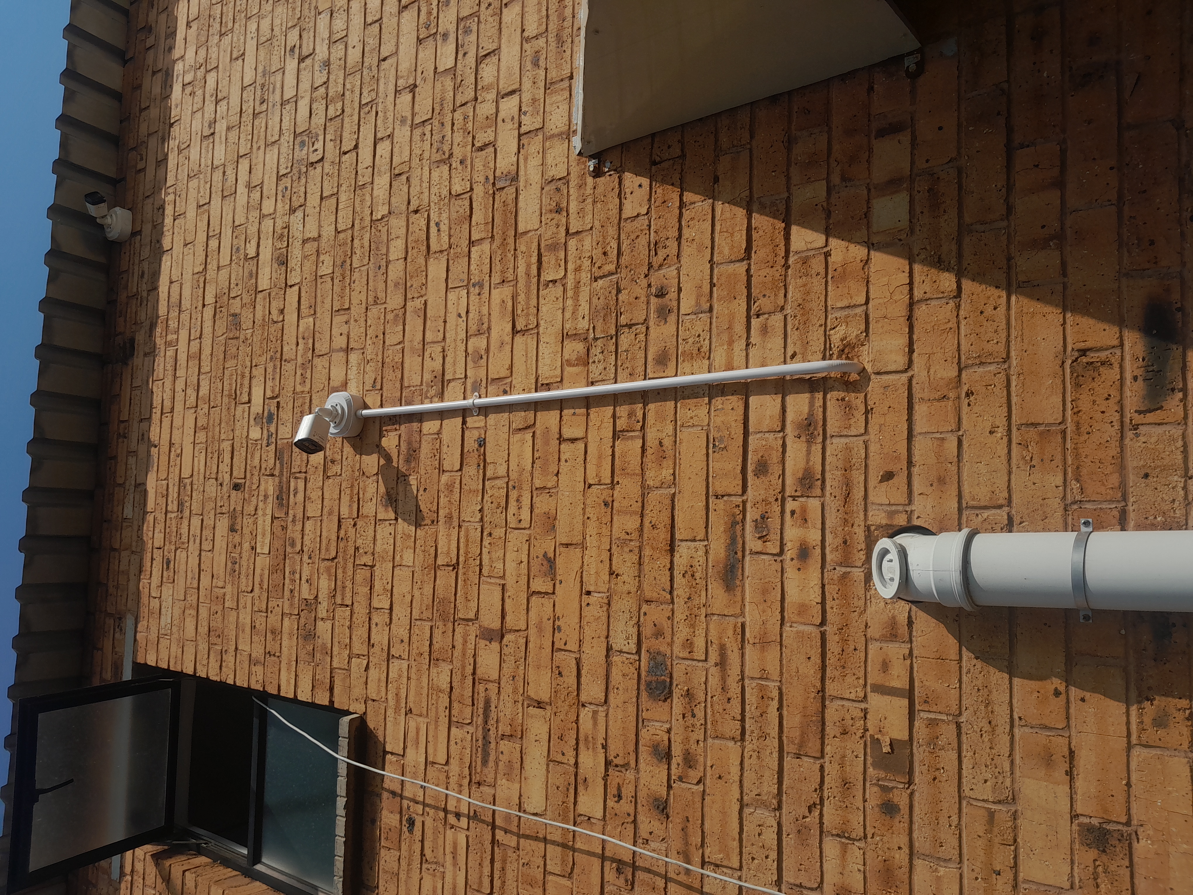 CCTV bullet camera on wall